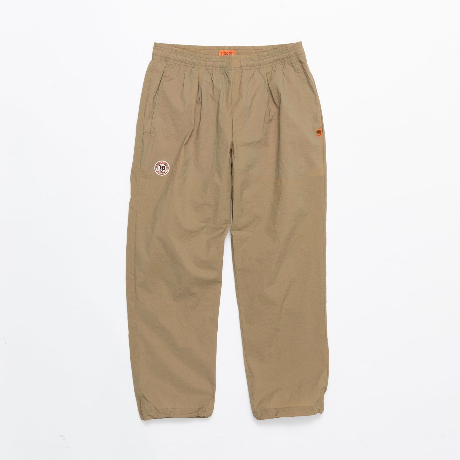 UNIVERSAL OVERALLxATHLETA – TBCパッカブルウインドパンツ