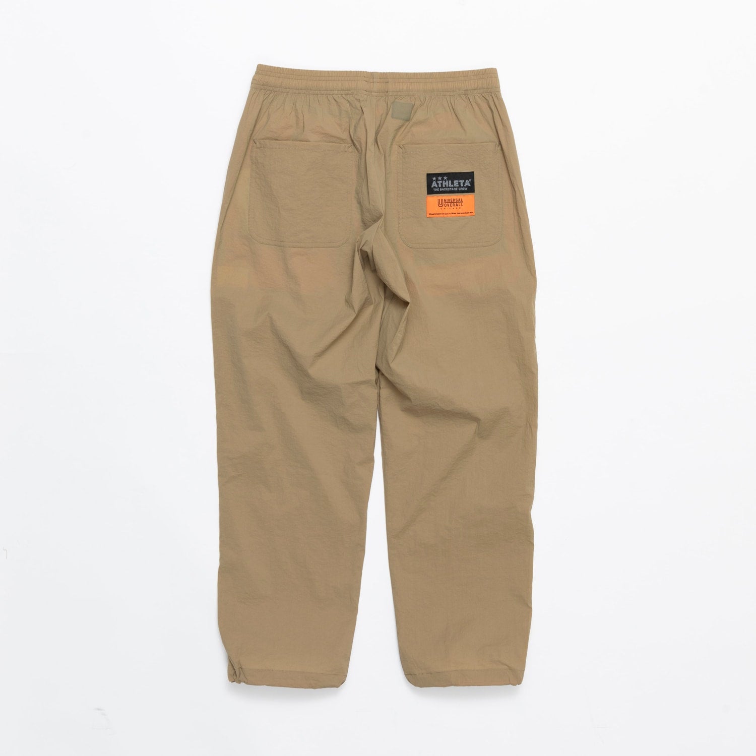 UNIVERSAL OVERALLxATHLETA – TBCパッカブルウインドパンツ
