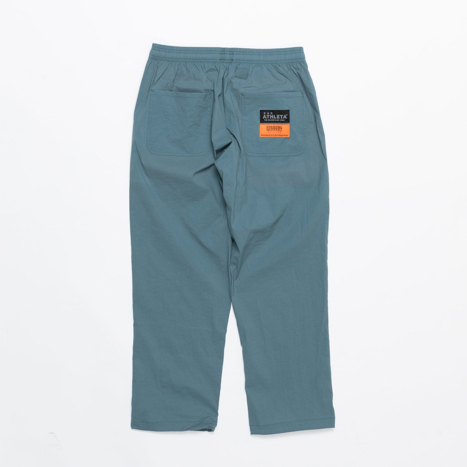 UNIVERSAL OVERALLxATHLETA – TBCパッカブルウインドパンツ