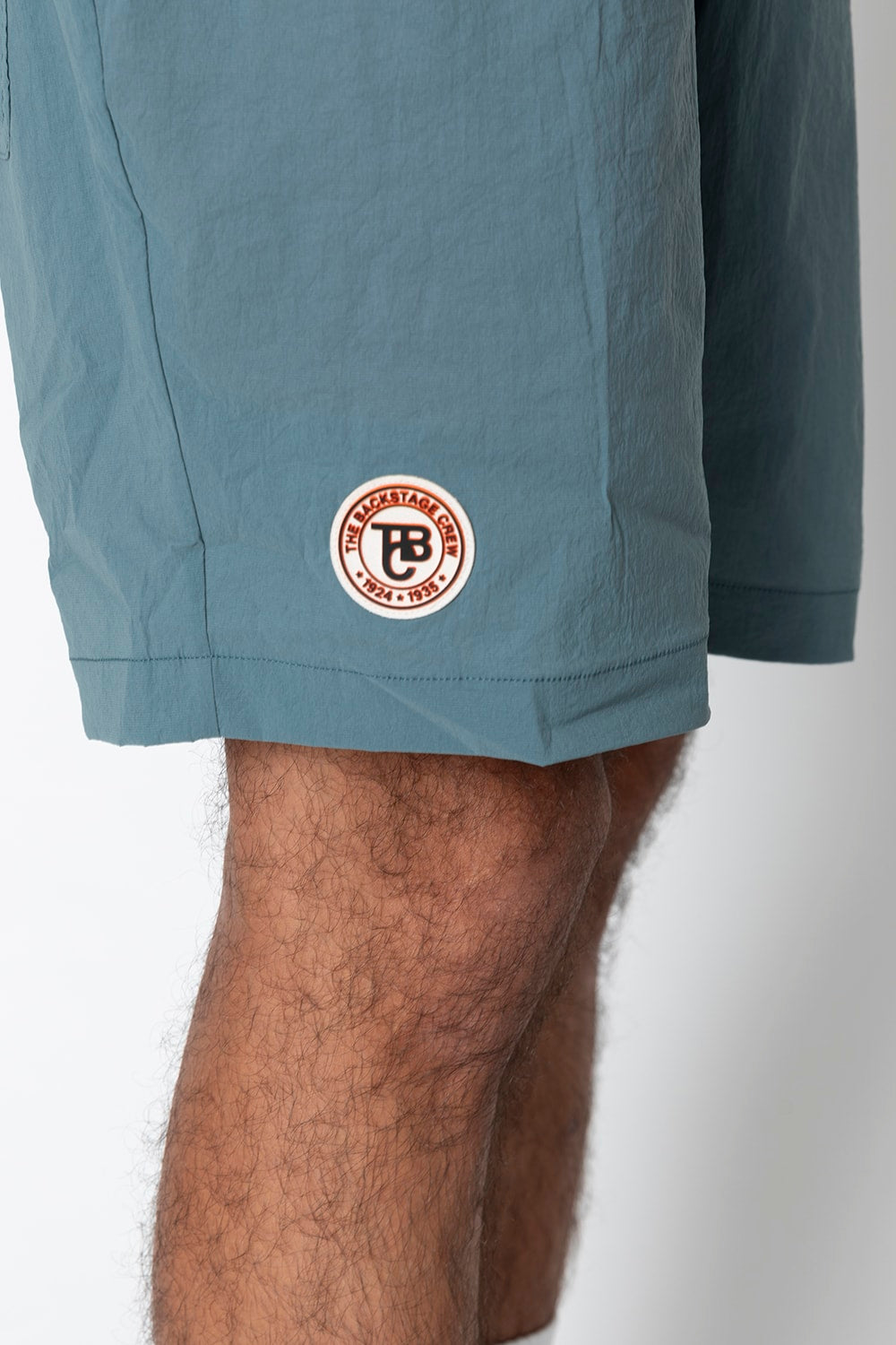 UNIVERSAL OVERALLxATHLETA – TBCパッカブルウインドショーツ