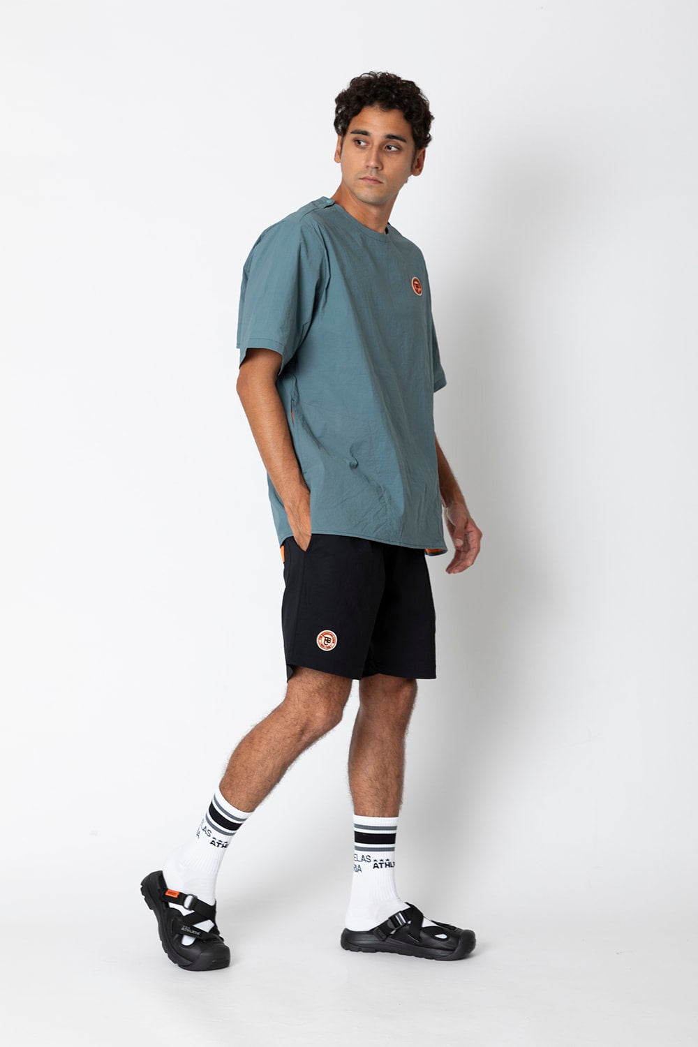 UNIVERSAL OVERALLxATHLETA – TBCパッカブルウインドシャツ