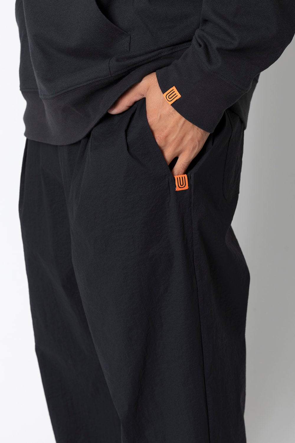 UNIVERSAL OVERALLxATHLETA – TBCパッカブルウインドパンツ