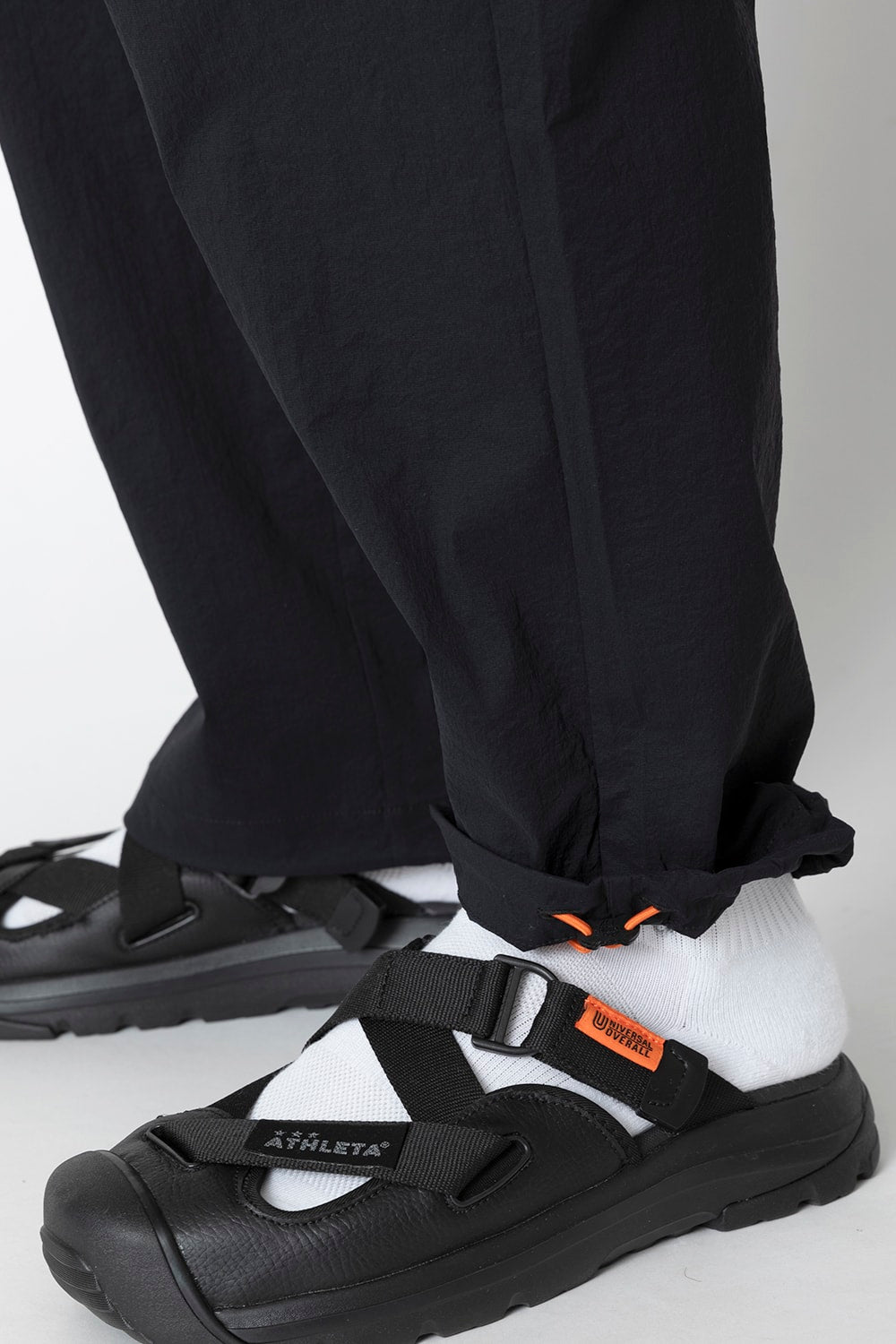 UNIVERSAL OVERALLxATHLETA – TBCパッカブルウインドパンツ