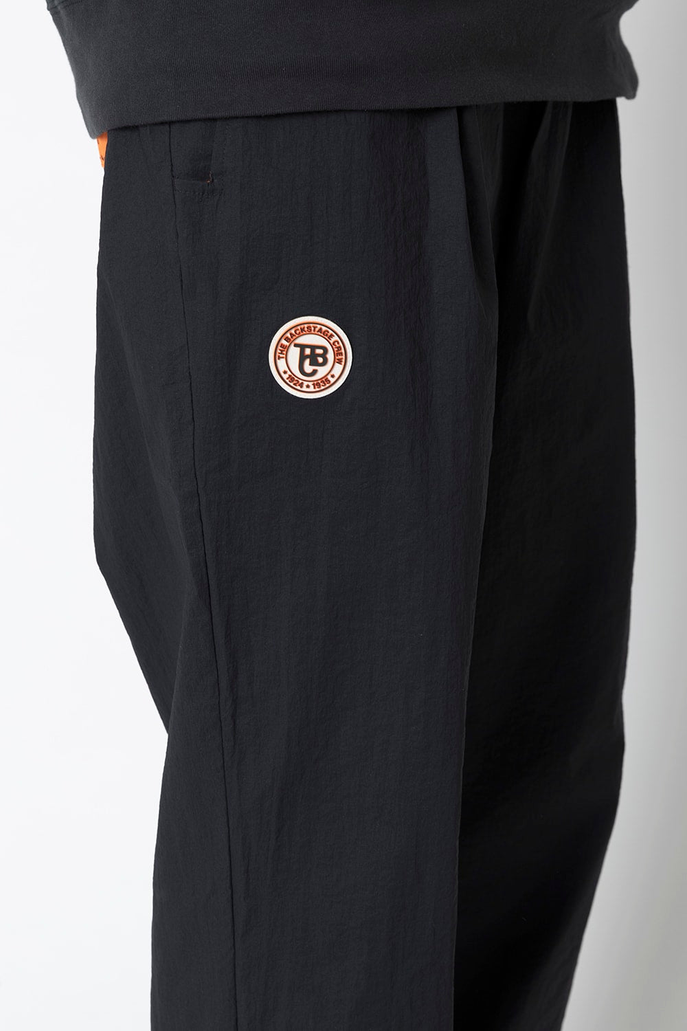 UNIVERSAL OVERALLxATHLETA – TBCパッカブルウインドパンツ