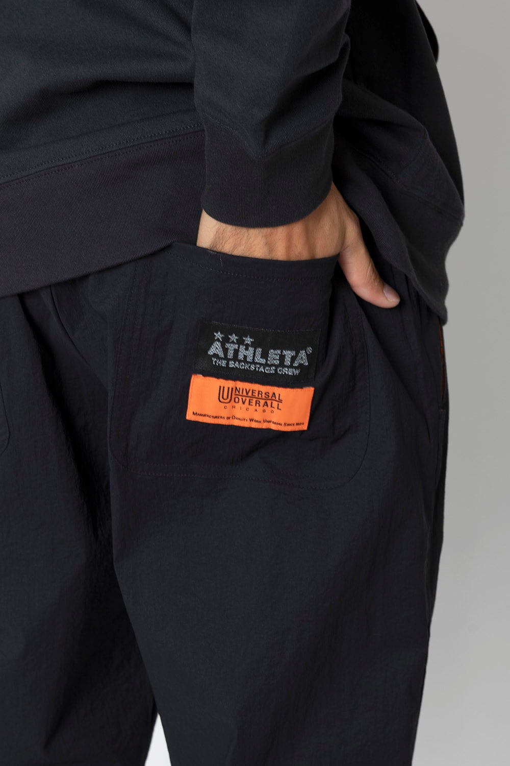 UNIVERSAL OVERALLxATHLETA – TBCパッカブルウインドパンツ