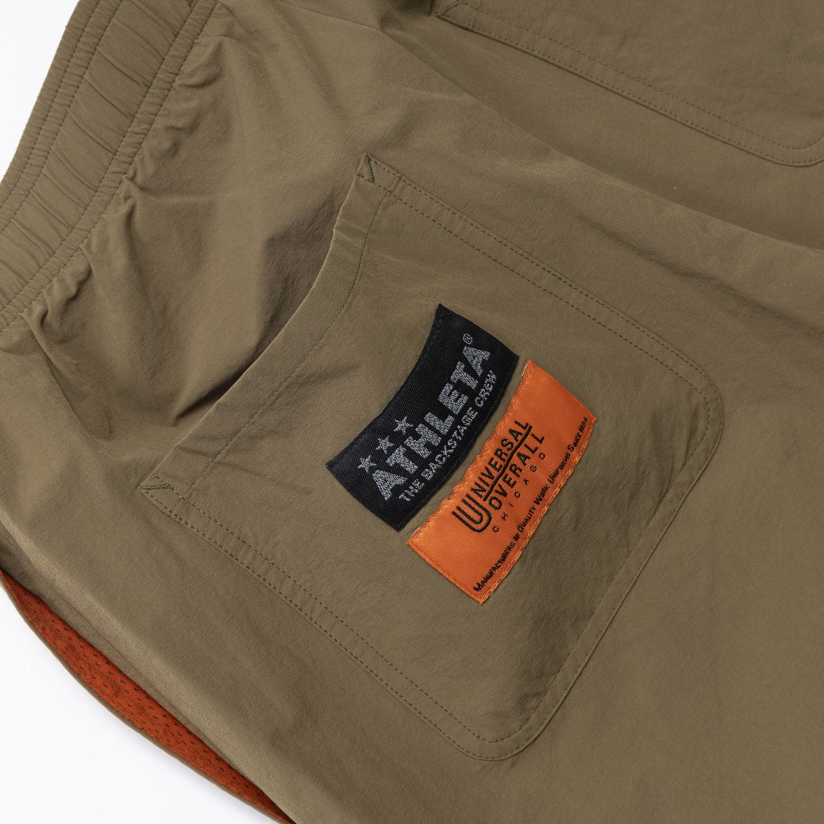 UNIVERSAL OVERALLxATHLETA - PACKABLE SHORTS