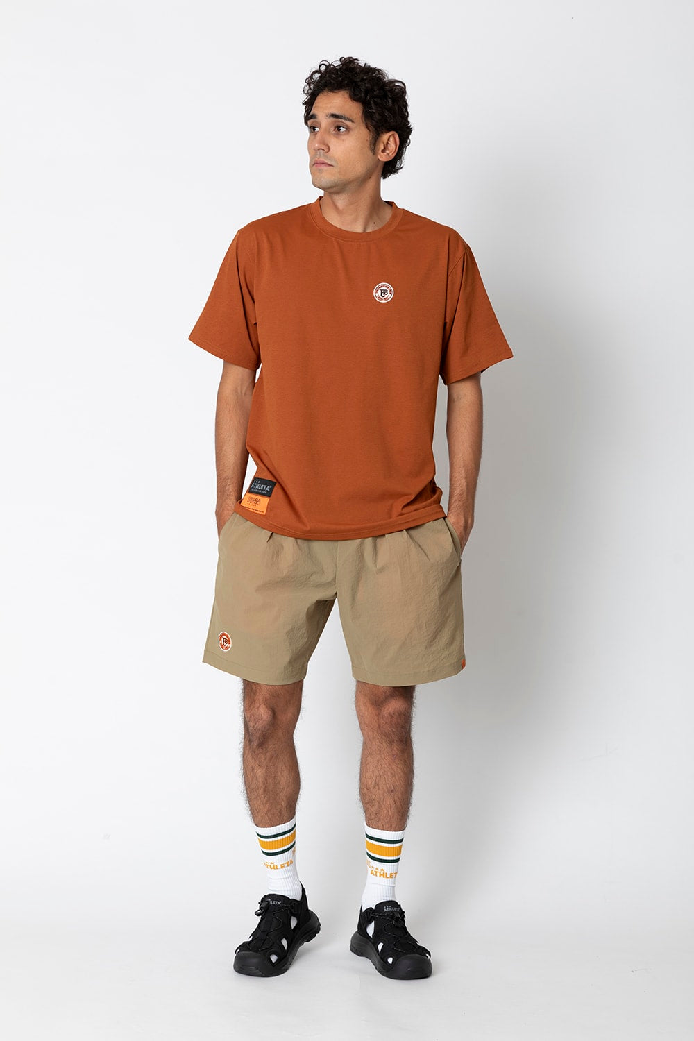 UNIVERSAL OVERALLｘATHLETA – TBCパッカブルウインドショーツ